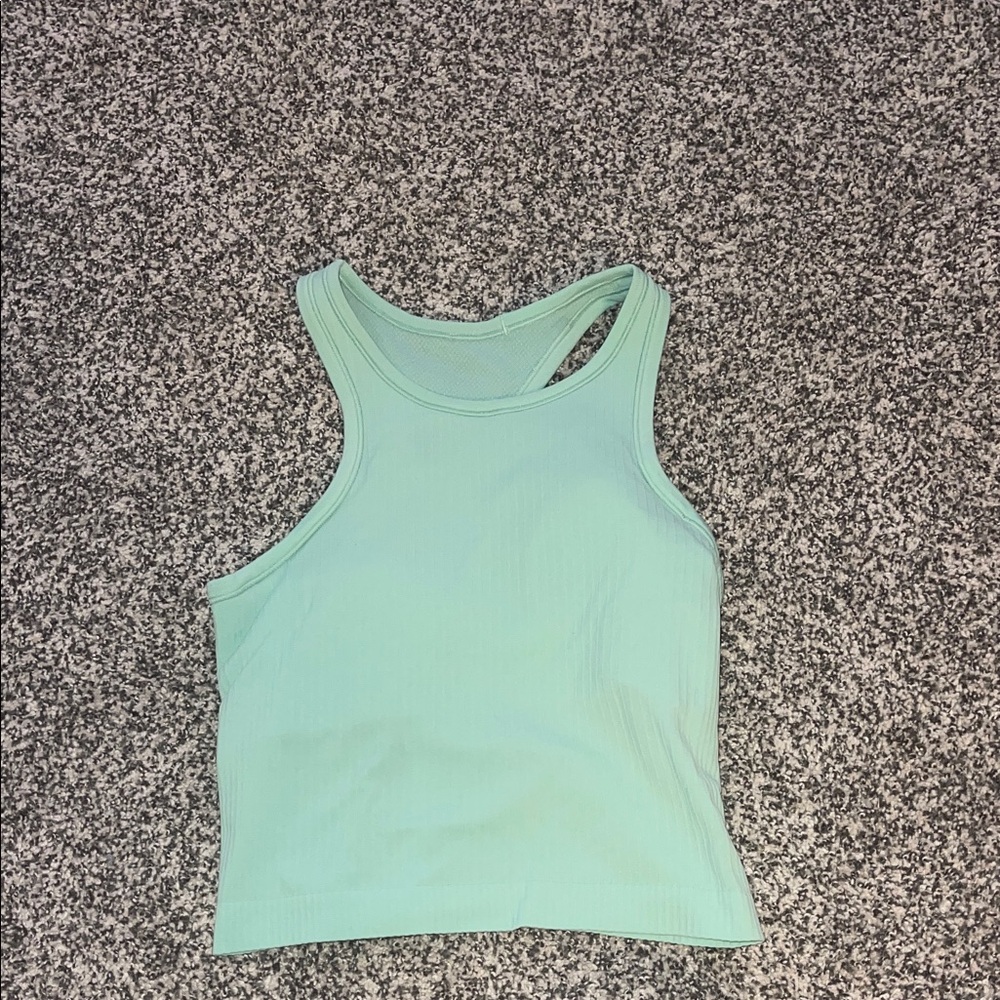 Lululemon cropped mint green ebb to street tank top. Padding included
